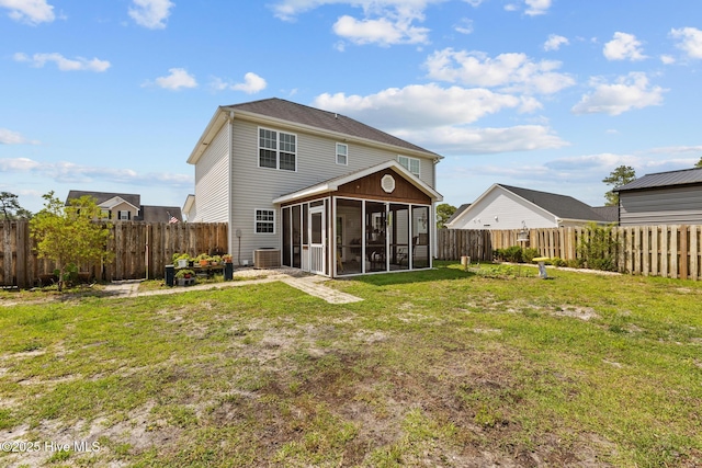 134 Inverness Dr, Hubert, NC 28539 - rear view of house featuring a sunroom and central air condition unit