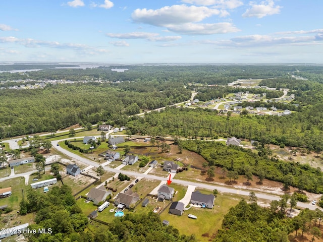 134 Inverness Dr, Hubert, NC 28539 - aerial view of property and surrounding area featuring a heavily wooded area