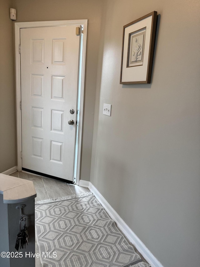 doorway with baseboards