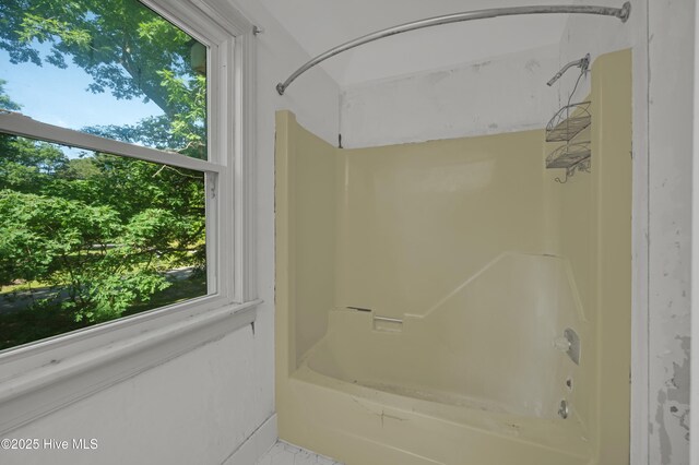bathroom featuring tub / shower combination