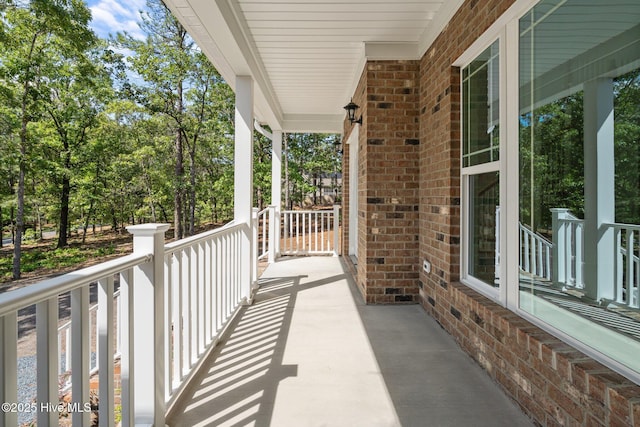 balcony featuring a porch