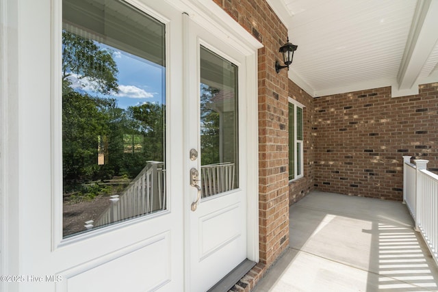 balcony featuring french doors
