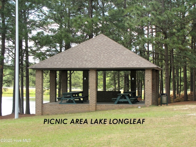view of home's community with a gazebo and a yard