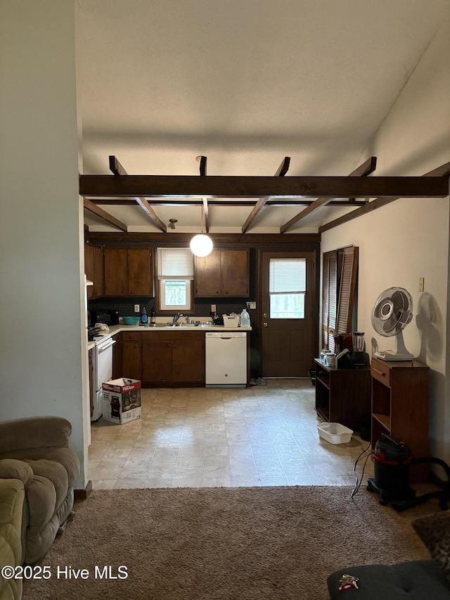 1501A B Dartmouth Ln, New Bern, NC 28562 - kitchen with white appliances, healthy amount of natural light, light countertops, open floor plan, and beam ceiling