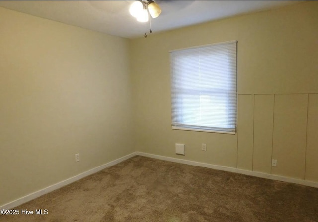 1501A B Dartmouth Ln, New Bern, NC 28562 - spare room with a ceiling fan, carpet floors, and baseboards