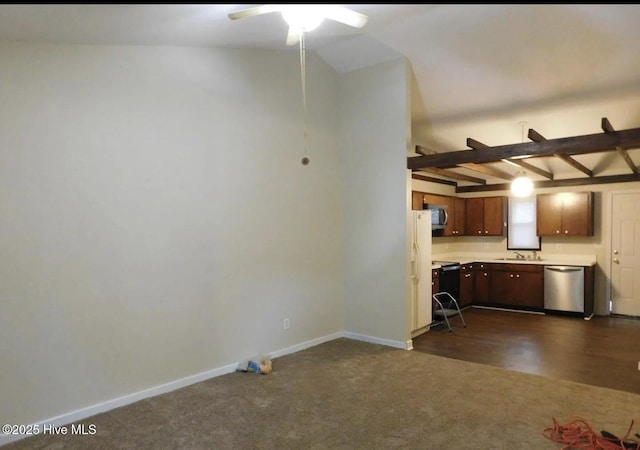 1501A B Dartmouth Ln, New Bern, NC 28562 - kitchen with appliances with stainless steel finishes, light countertops, ceiling fan, dark colored carpet, and lofted ceiling