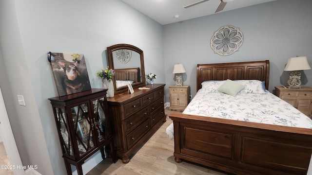 bedroom featuring light wood finished floors