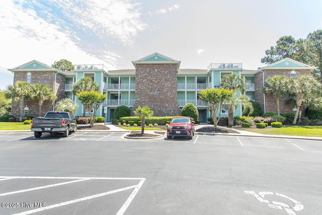 139 Avian Dr Unit 3614, Sunset Beach, NC 28468 - view of property with uncovered parking