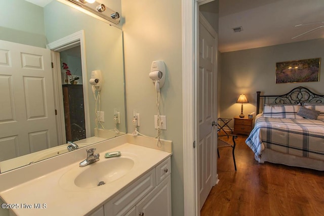 139 Avian Dr Unit 3614, Sunset Beach, NC 28468 - bathroom with wood finished floors and vanity