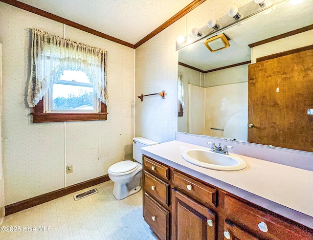 434 Farless Rd, Merry Hill, NC 27957 - bathroom with ornamental molding, vanity, toilet, tile patterned floors, and a textured ceiling
