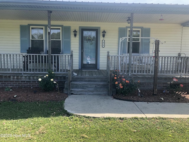 434 Farless Rd, Merry Hill, NC 27957 - doorway to property featuring covered porch
