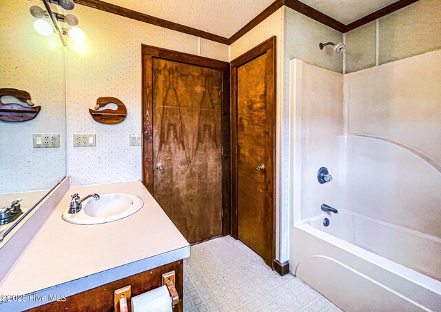 434 Farless Rd, Merry Hill, NC 27957 - bathroom featuring crown molding, shower / bathtub combination, vanity, and wallpapered walls