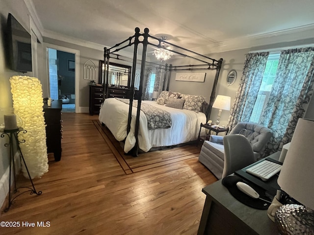 310 N Franklin St, Whiteville, NC 28472 - bedroom featuring ornamental molding and wood finished floors