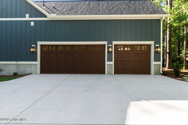 garage featuring driveway
