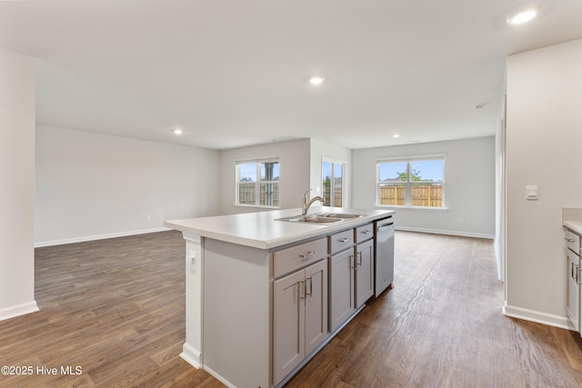 3522 Wigeon Way, Winnabow, NC 28479 - kitchen with a sink, open floor plan, dishwasher, wood finished floors, and light countertops
