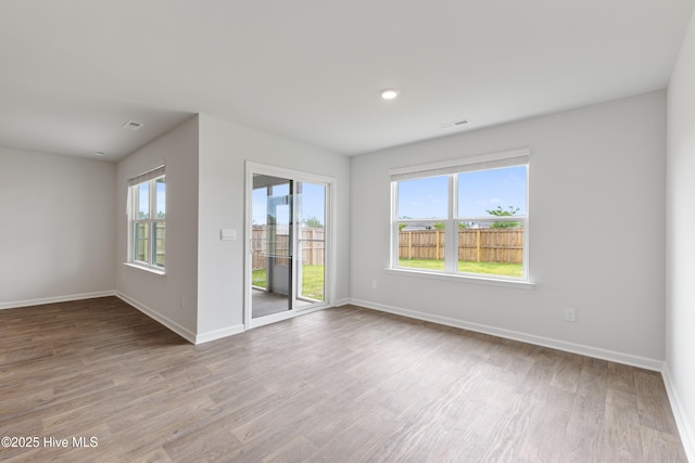 3522 Wigeon Way, Winnabow, NC 28479 - unfurnished room featuring light wood finished floors, baseboards, and recessed lighting