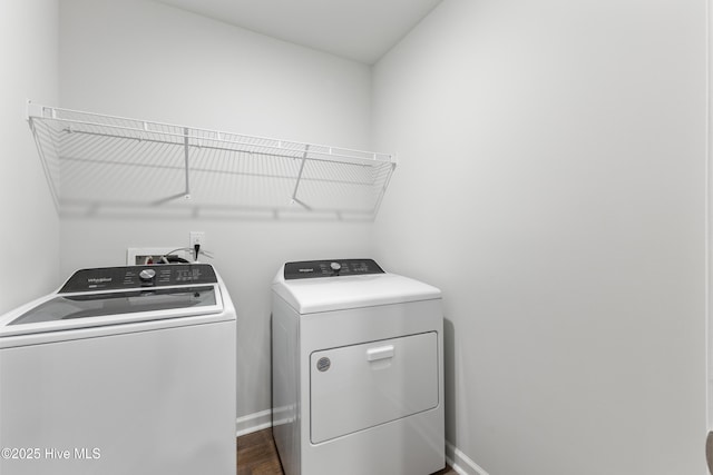 3522 Wigeon Way, Winnabow, NC 28479 - laundry area featuring washing machine and clothes dryer, baseboards, and dark wood-style floors