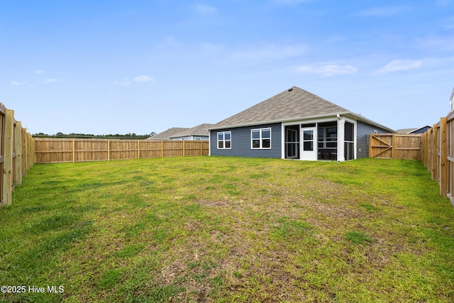 3522 Wigeon Way, Winnabow, NC 28479 - rear view of property featuring a sunroom and a shingled roof