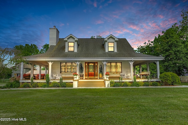 3297 Bay City Rd, Aurora, NC 27806 - view of front of property with a porch, a front lawn, and a chimney
