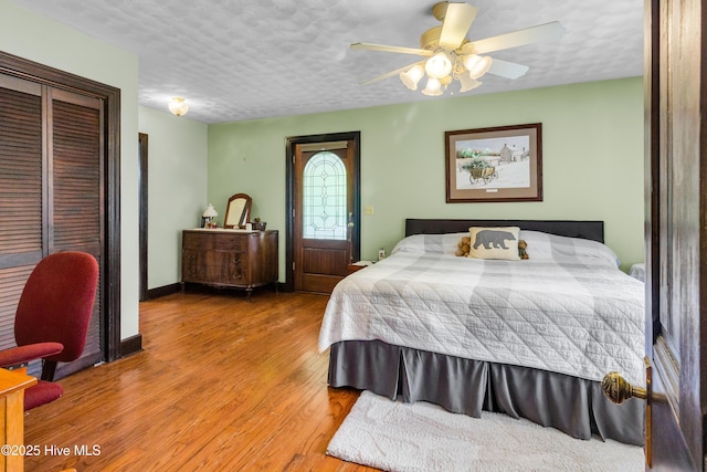3297 Bay City Rd, Aurora, NC 27806 - bedroom with wood finished floors, a closet, and ceiling fan