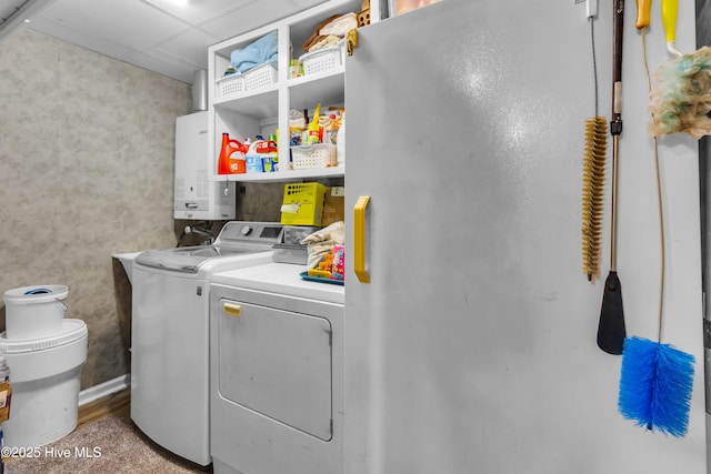 3297 Bay City Rd, Aurora, NC 27806 - laundry area featuring washer and clothes dryer and water heater