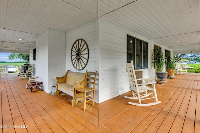 3297 Bay City Rd, Aurora, NC 27806 - wooden terrace with covered porch