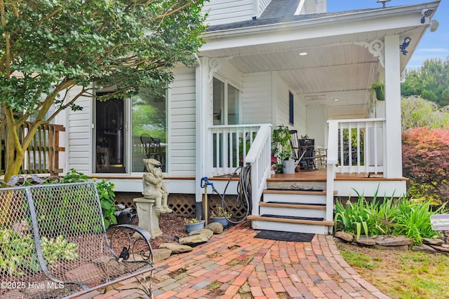 3297 Bay City Rd, Aurora, NC 27806 - view of exterior entry with a porch