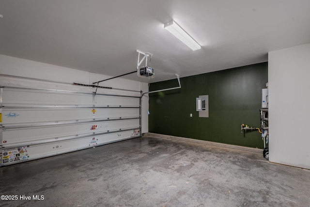 garage featuring a garage door opener and electric panel