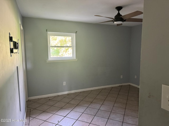 7 Walnut Dr, Jacksonville, NC 28546 - spare room with a ceiling fan, light tile patterned floors, and baseboards