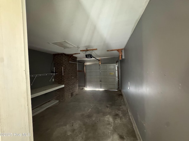 7 Walnut Dr, Jacksonville, NC 28546 - garage with baseboards and a garage door opener