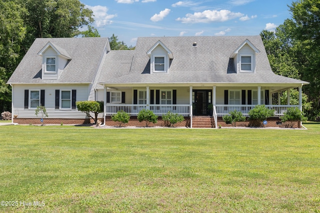 338 Country Club Rd, Camden, NC 27921 - cape cod home featuring a front yard, covered porch, and roof with shingles