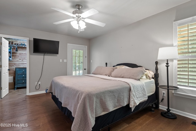 338 Country Club Rd, Camden, NC 27921 - bedroom with wood finished floors, baseboards, ceiling fan, and a walk in closet