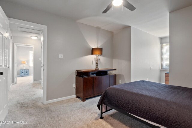 338 Country Club Rd, Camden, NC 27921 - bedroom with light colored carpet, baseboards, attic access, and ceiling fan