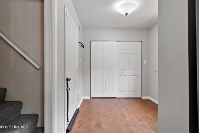 338 Country Club Rd, Camden, NC 27921 - hall with light wood-style flooring, baseboards, and stairway