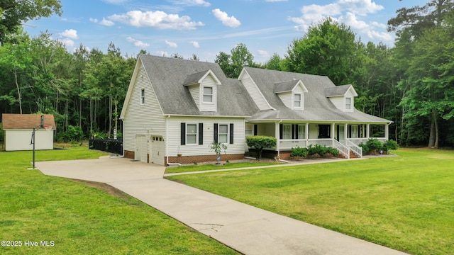 338 Country Club Rd, Camden, NC 27921 - cape cod home featuring a porch, a front yard, a garage, and roof with shingles