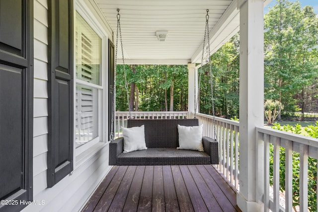 338 Country Club Rd, Camden, NC 27921 - wooden deck with a porch and view of scattered trees
