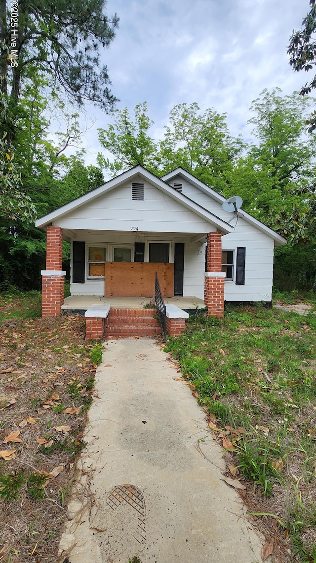 bungalow-style house with covered porch