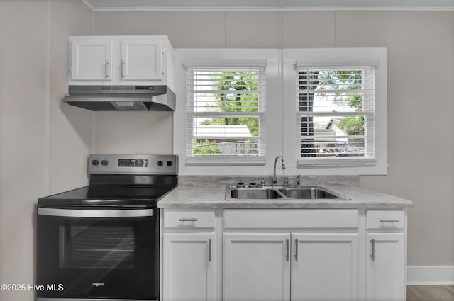kitchen featuring stainless steel electric stove, under cabinet range hood, a sink, white cabinets, and light countertops