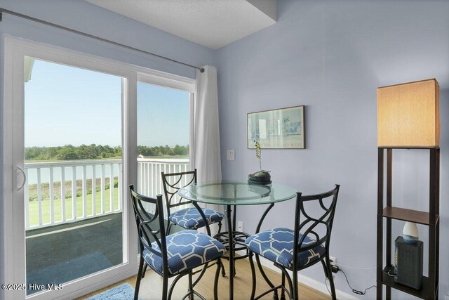 1912 Goose Creek Rd SW Unit 4302, Ocean Isle Beach, NC 28469 - dining area with light wood finished floors and baseboards