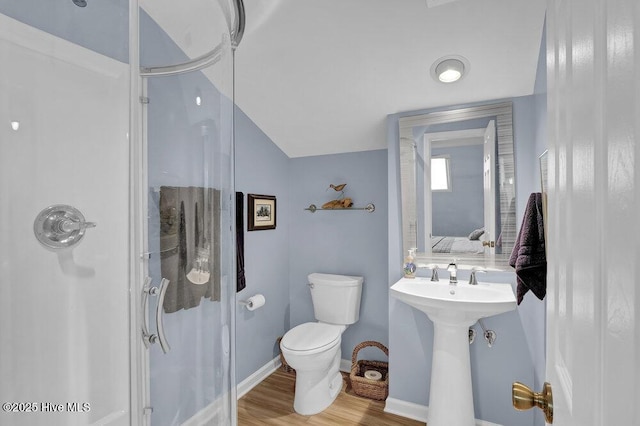 1912 Goose Creek Rd SW Unit 4302, Ocean Isle Beach, NC 28469 - full bathroom with a stall shower, toilet, wood finished floors, a sink, and baseboards