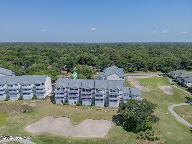 1912 Goose Creek Rd SW Unit 4302, Ocean Isle Beach, NC 28469 - drone / aerial view of a heavily wooded area and a golf club