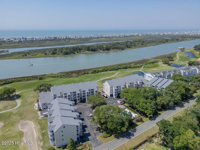 1912 Goose Creek Rd SW Unit 4302, Ocean Isle Beach, NC 28469 - aerial view of apartment complex, a nearby body of water, and a golf club
