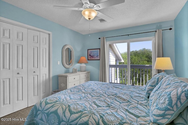 1912 Goose Creek Rd SW Unit 4302, Ocean Isle Beach, NC 28469 - bedroom featuring carpet flooring, a textured ceiling, a closet, and a ceiling fan