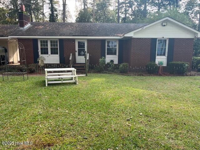 1616 Hwy 58 S, Snow Hill, NC 28580 - ranch-style home featuring brick siding, a chimney, and a front lawn