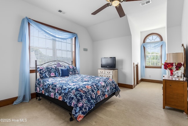 bedroom featuring carpet floors, lofted ceiling, baseboards, and a ceiling fan
