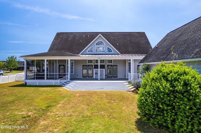 rear view of property with a standing seam roof, metal roof, french doors, covered porch, and a shingled roof