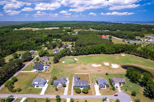 aerial perspective of suburban area with a local golf course