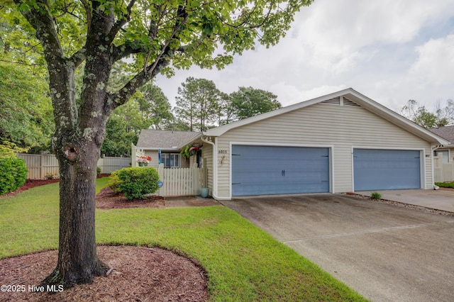 6025 Inland Greens Dr, Wilmington, NC 28405 - single story home with driveway and an attached garage