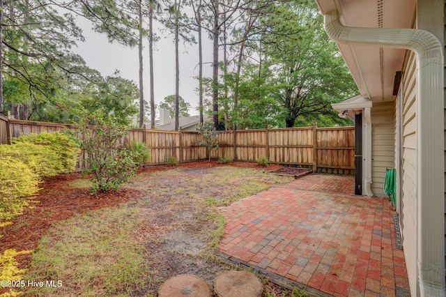 6025 Inland Greens Dr, Wilmington, NC 28405 - fenced backyard featuring a patio