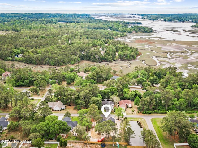 3122 Oak Dr SW, Shallotte, NC 28470 - aerial perspective of suburban area with a forest